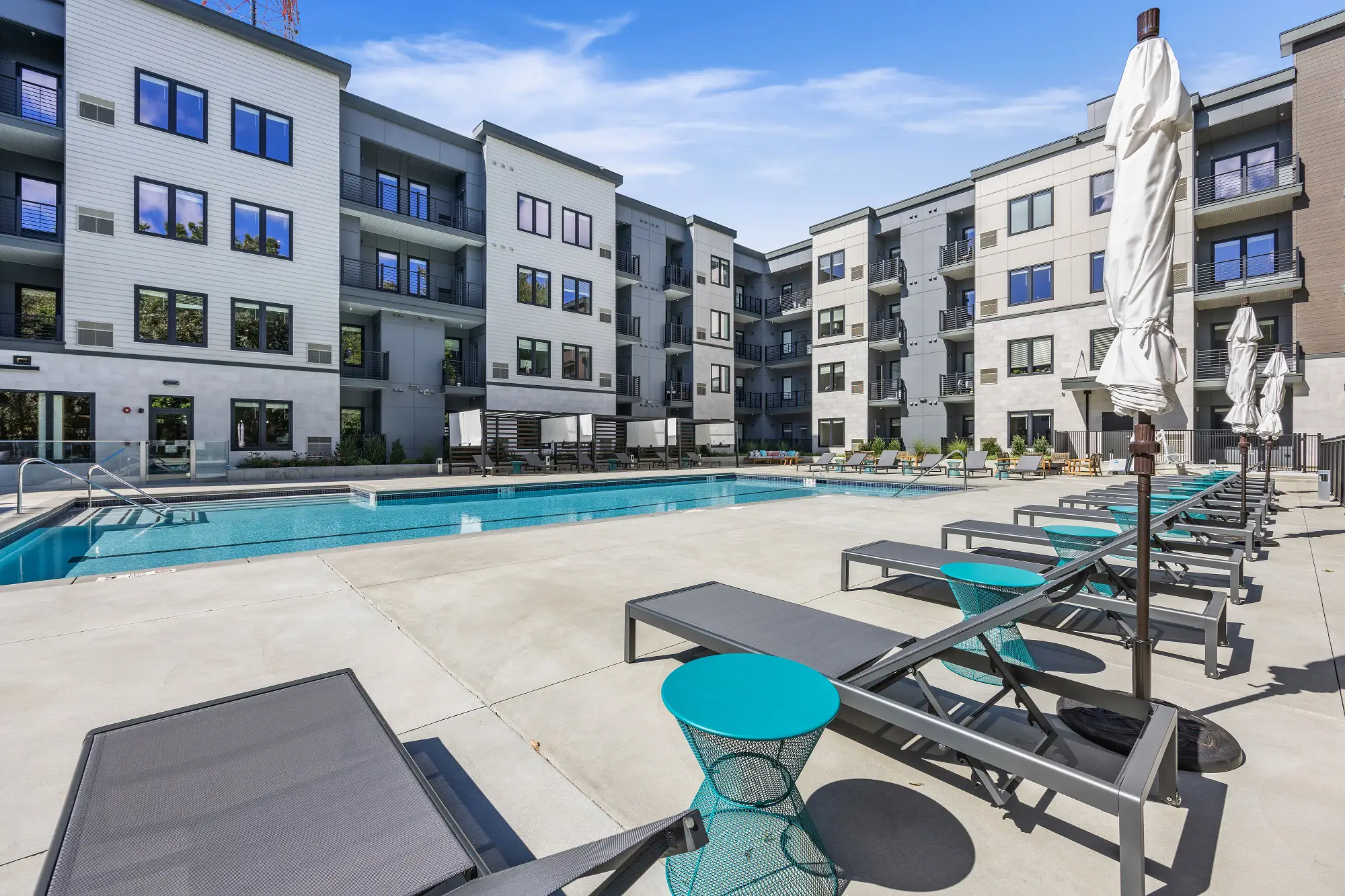 The Beacon pool courtyard with cabanas - Norwalk, CT